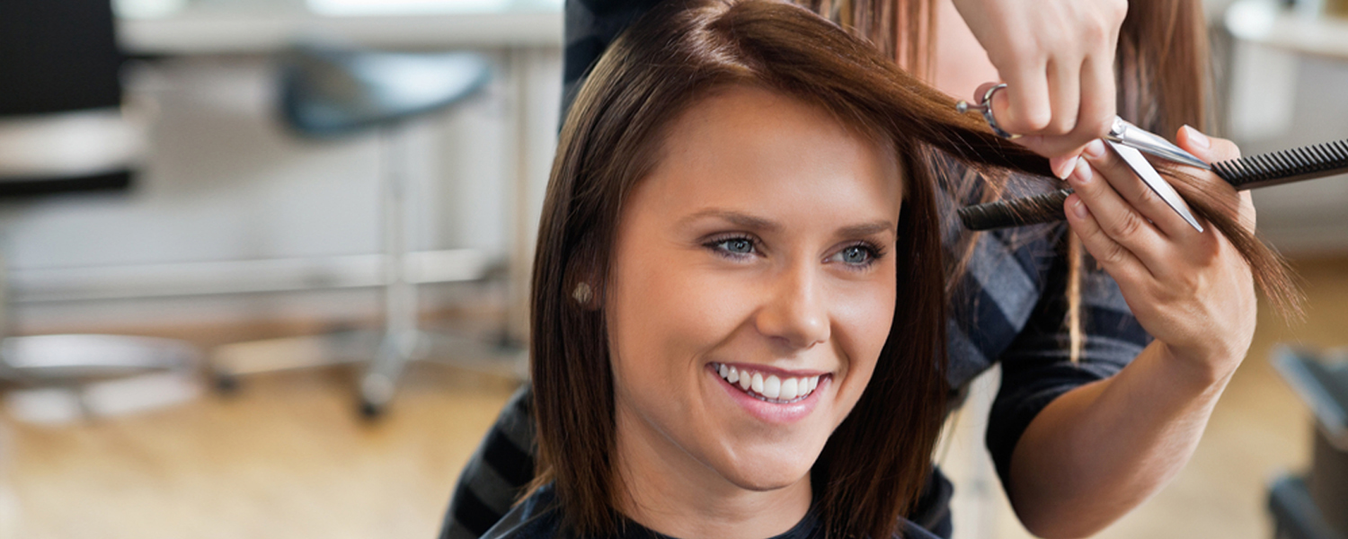 A girl getting her hair cut